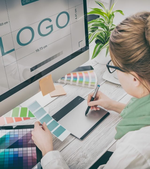 Graphic designer at work. Color samples. logo design brand designer sketch graphic drawing creative creativity draw studying work tablet concept - stock image